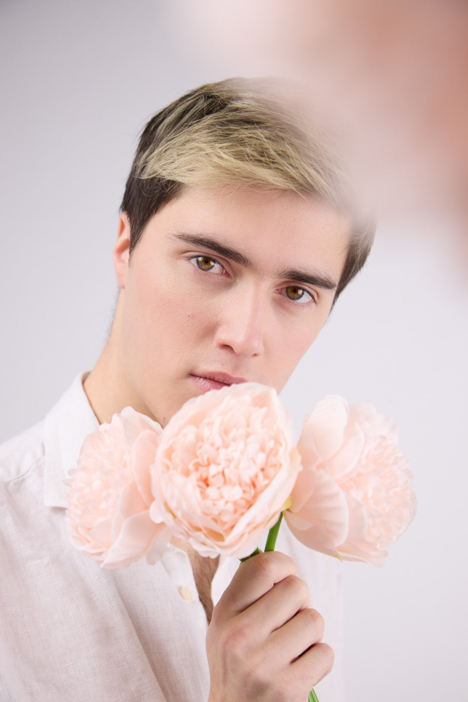 Man Holding Pink Flowers